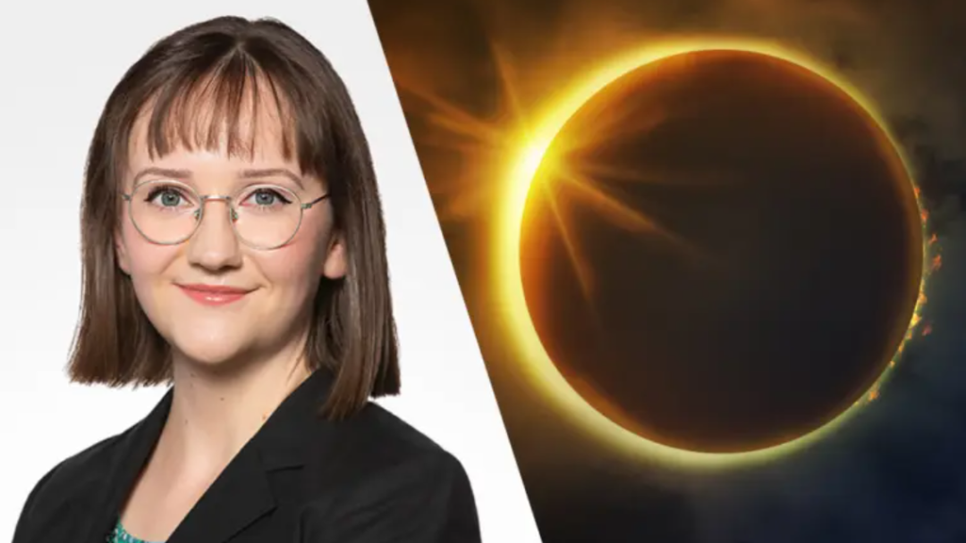 Abby Kulisz next to an eclipse